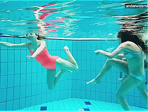 three bare ladies have joy underwater